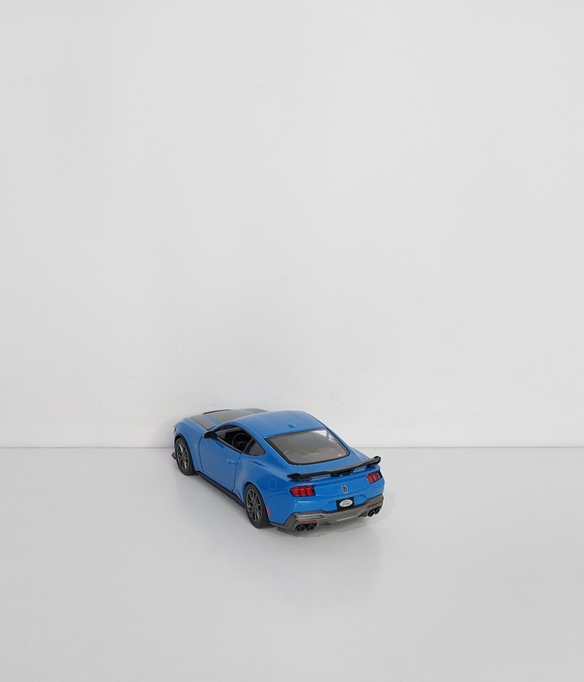  خرید آنلاین ماکت Ford Mustang 2024 Dark Horse کینسمارت، فلزی قرمز، مقیاس ۱/۳۸ و عقب‌کش 